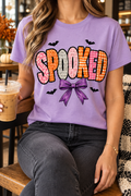 Spooked Bow modeled shirt, cropped below the face
