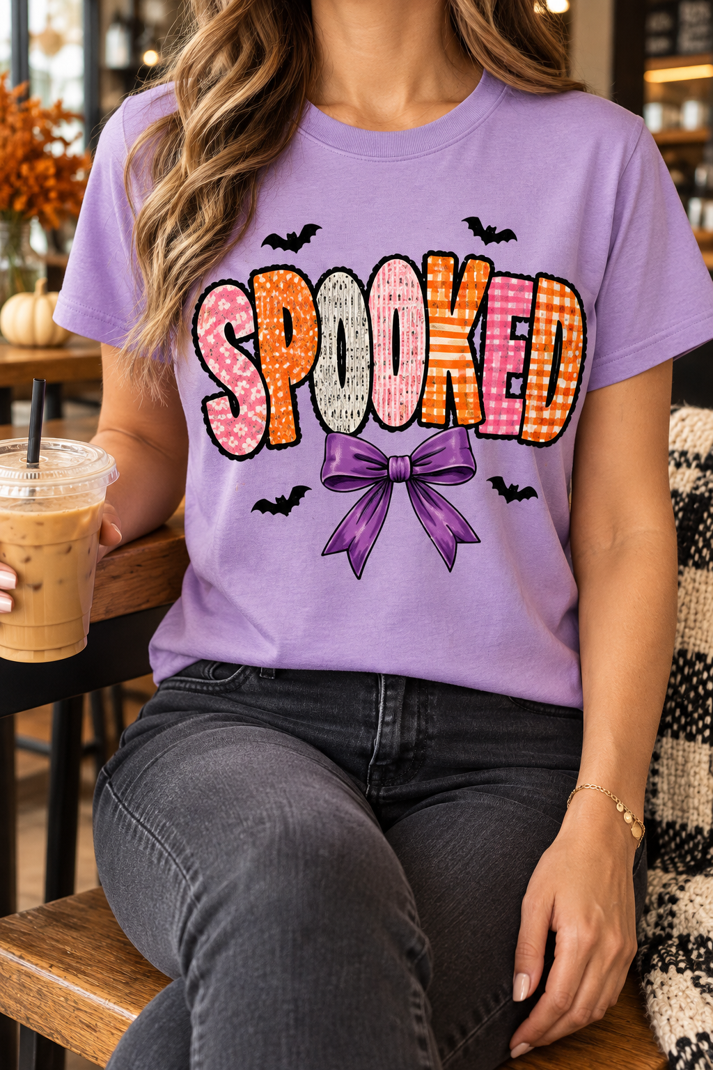 Spooked Bow modeled shirt, cropped below the face