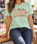 A Little Love Goes a Long Way boutique modeled mockup